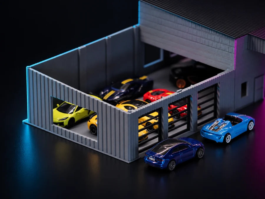 Frame 4 — close on the racks, four levels of cars behind the open bays.