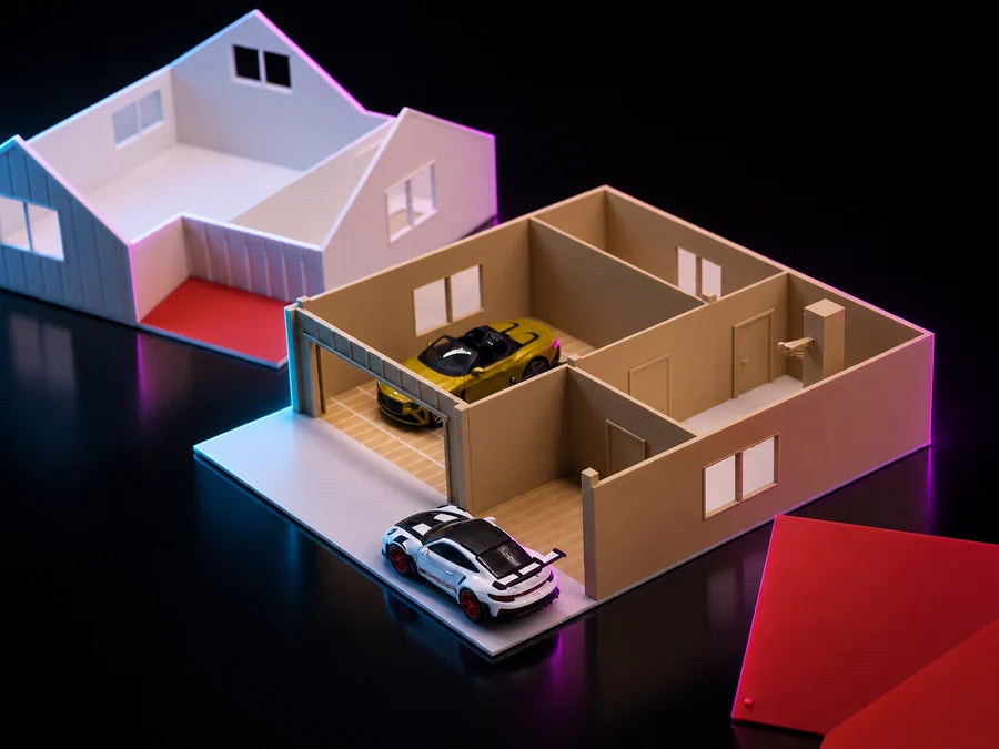 Frame 3 — the roof lifted off and set down beside the house, the rooms open from above and a car inside the bay.