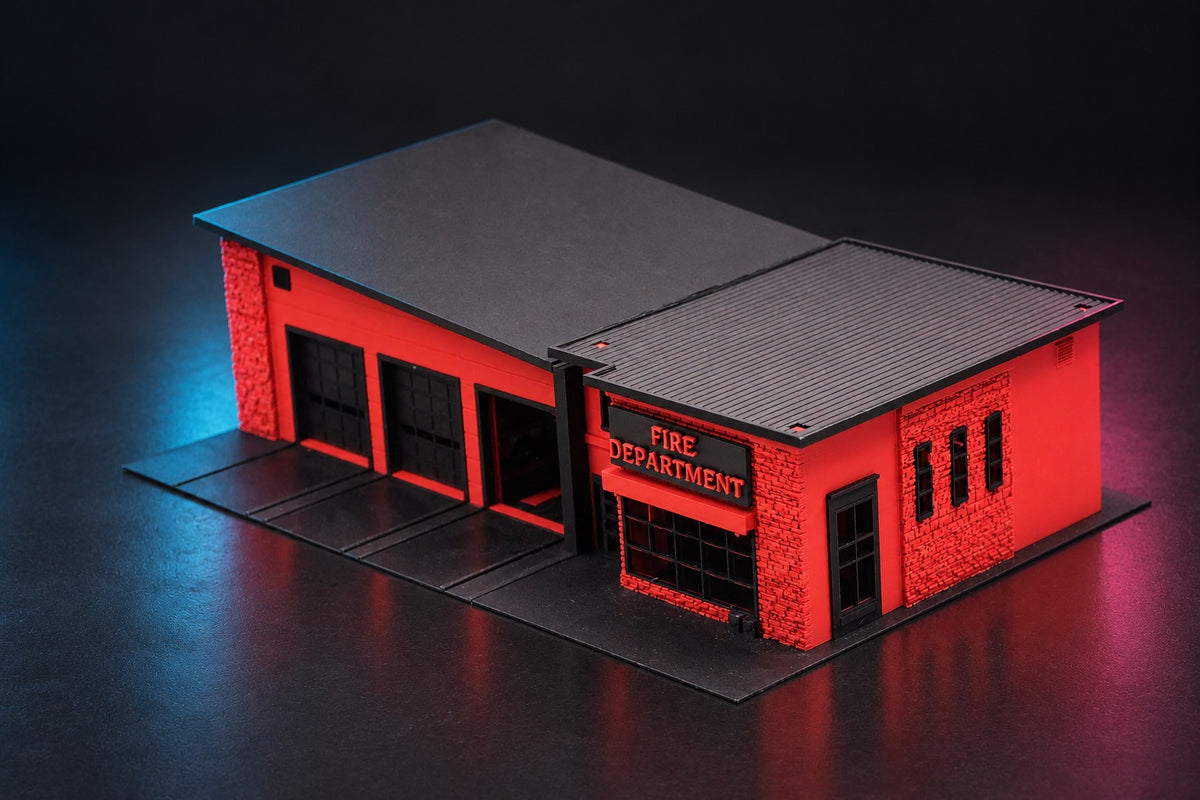 Fire station diorama from the front corner, three bay doors and the FIRE DEPARTMENT office wing