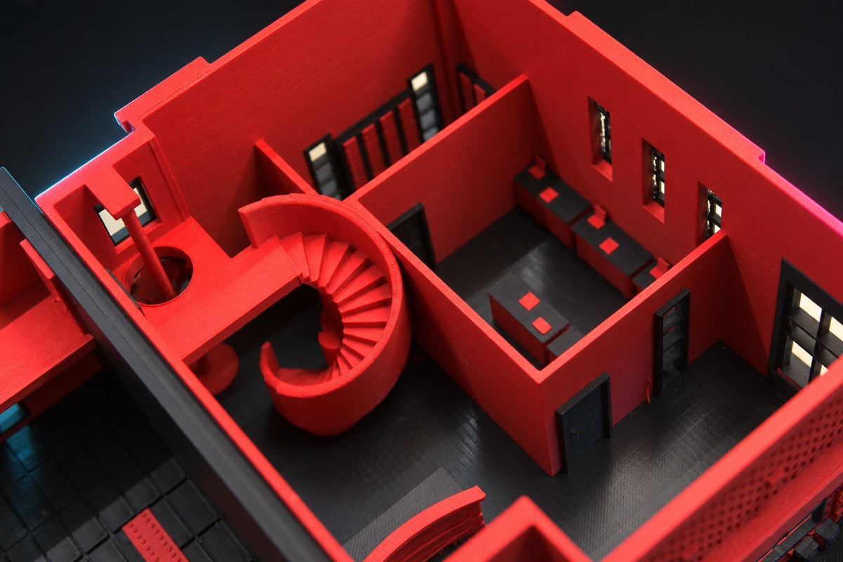 Inside the fire station office wing with the roof off, spiral staircase and fire pole