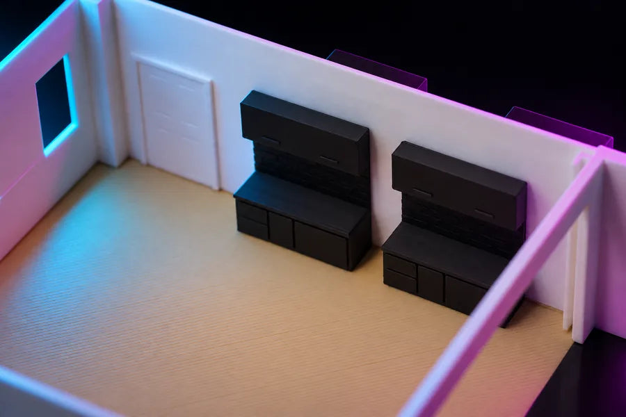 Frame 4 — two TV units against an interior wall beside a white door, each a tall back panel above a low cabinet.