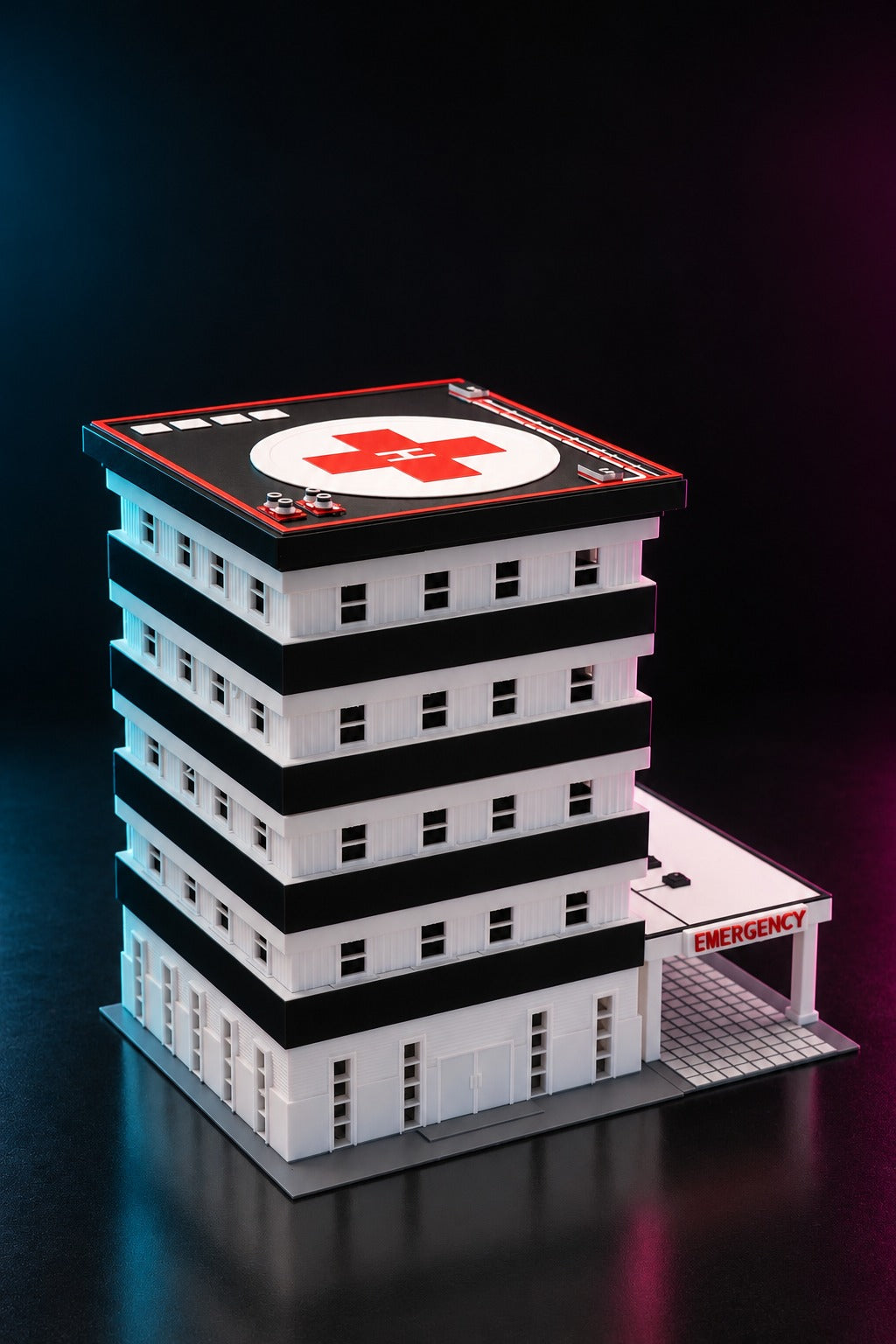 Five-story 1:64 hospital diorama with a rooftop helipad and EMERGENCY canopy