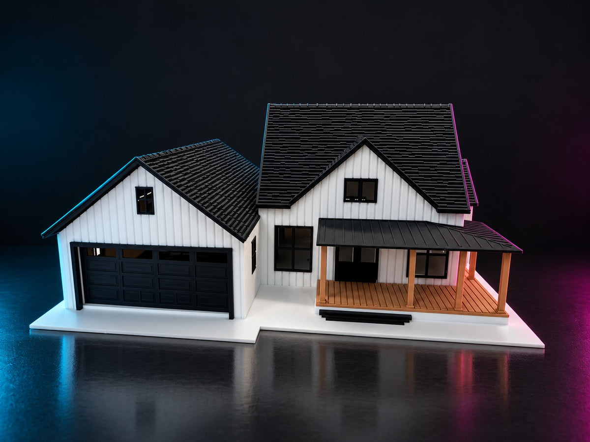 Front view of the 1:64 modern farmhouse with its black garage door and porch steps