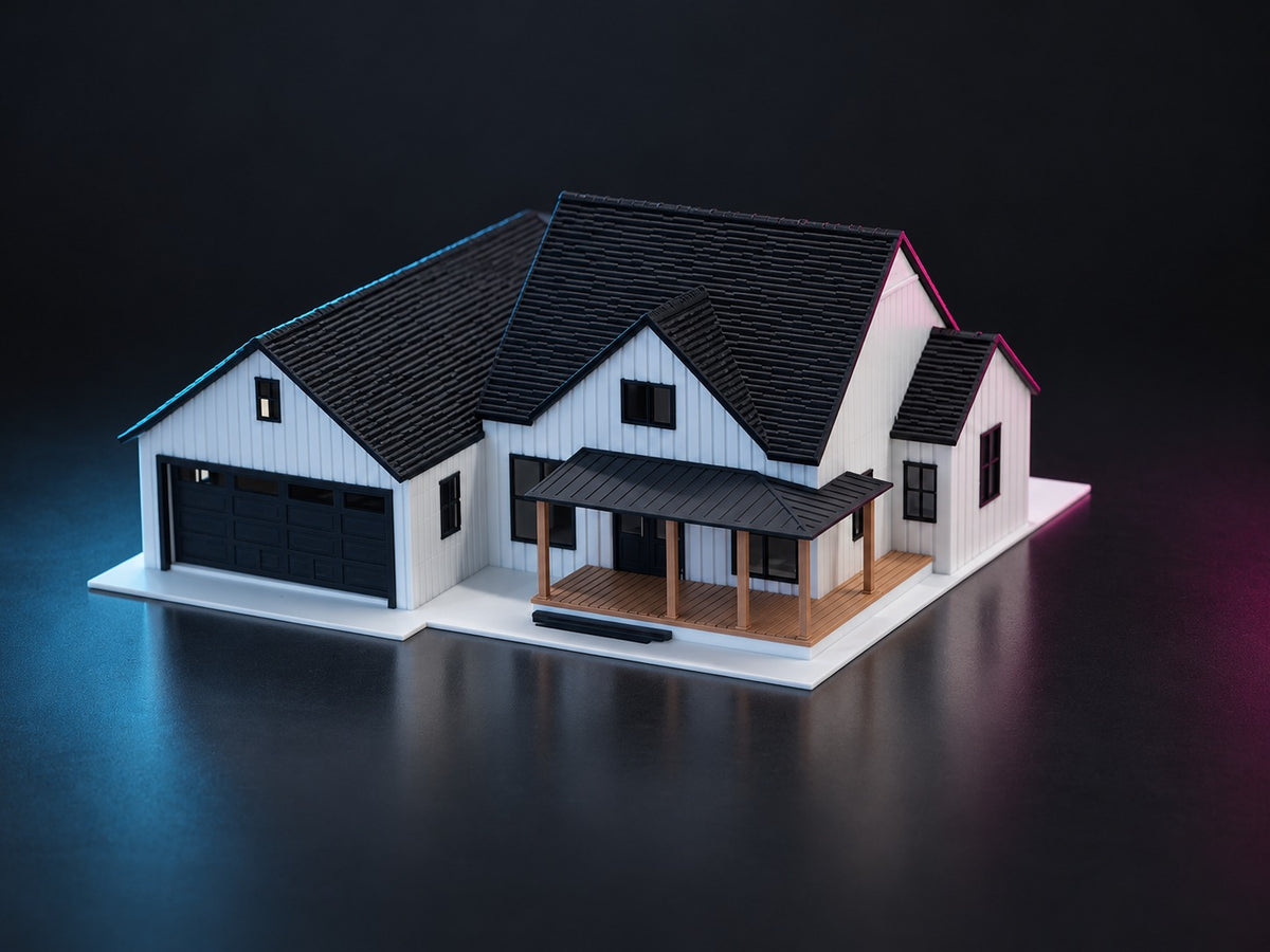 The 1:64 modern farmhouse at three-quarters, showing the roofline and side gables