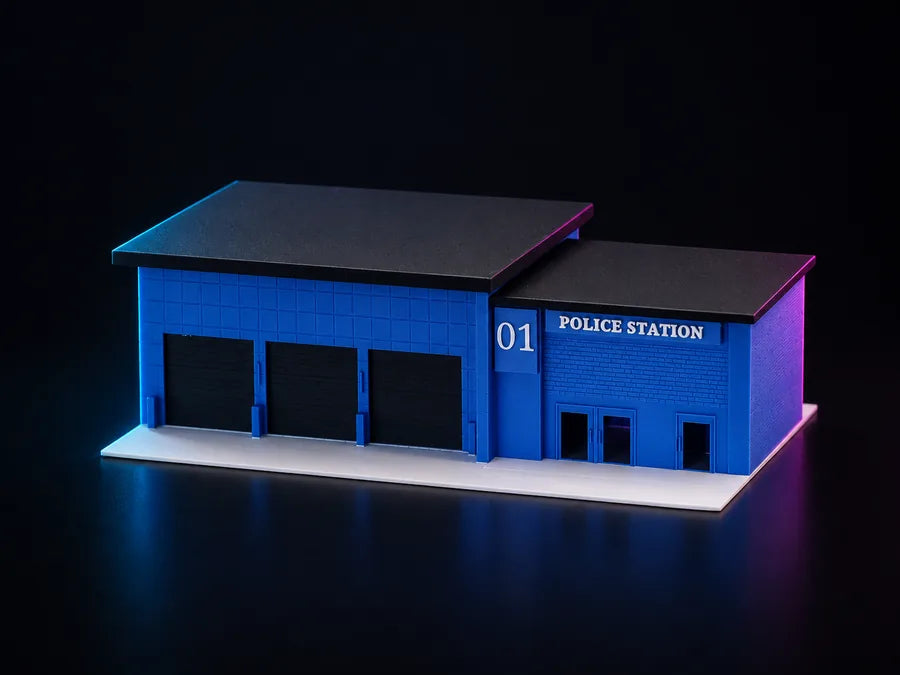 Frame 2 — the three-quarter with the shutters down, the panelled blue wall, all three bays and the 01 tower beside the POLICE STATION wing.