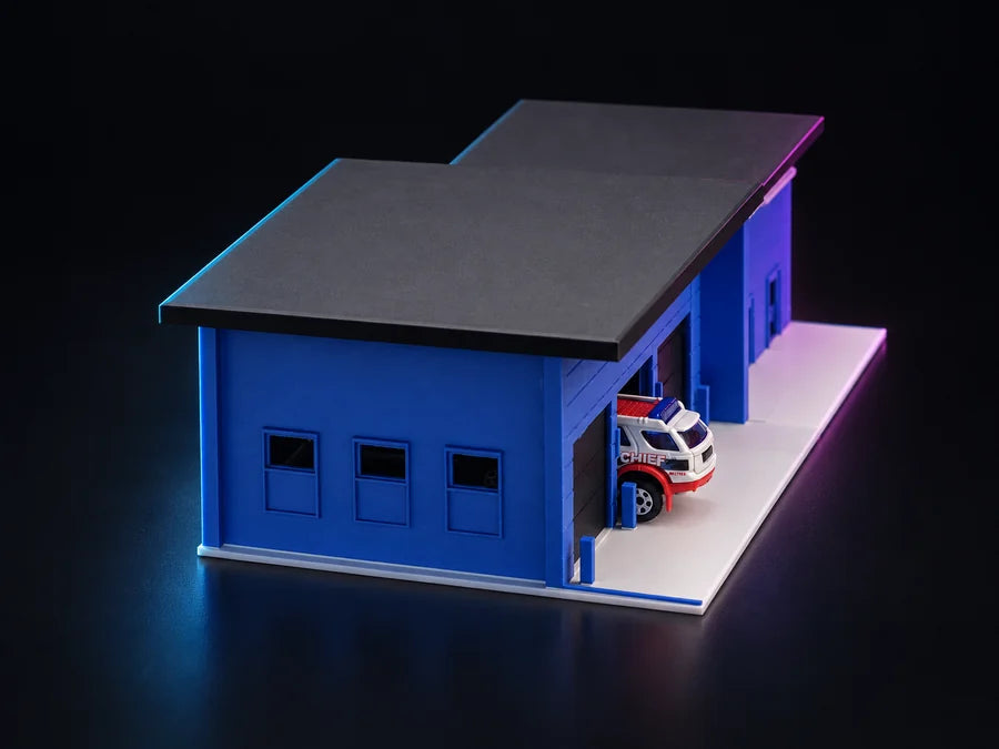 Frame 4 — the front three-quarter from above, the bay open and a squad car nosed in under the lit opening.