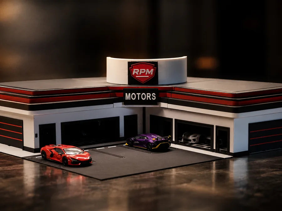 Frame 5 — the front three-quarter from ground level, both showroom wings in view and cars out on the forecourt.