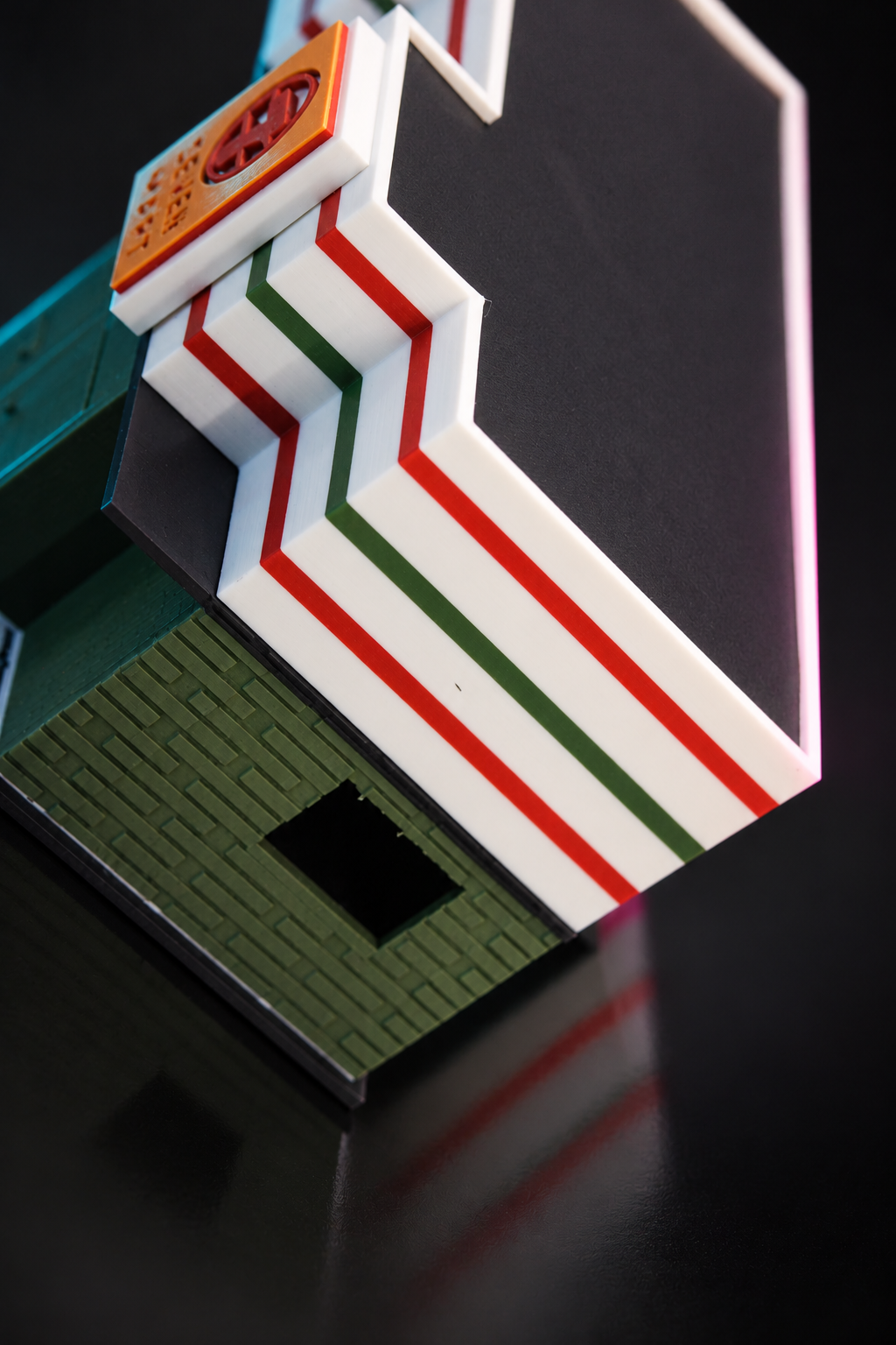 Overhead view of the stepped roofline and stripes on the 1:64 Seven Mart diorama