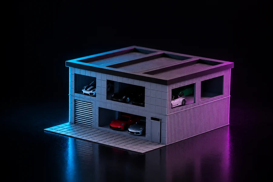 A printed two-storey car showroom lit in cyan and magenta, open display bays on both floors with cars parked at the edge and a tiled forecourt in front.
