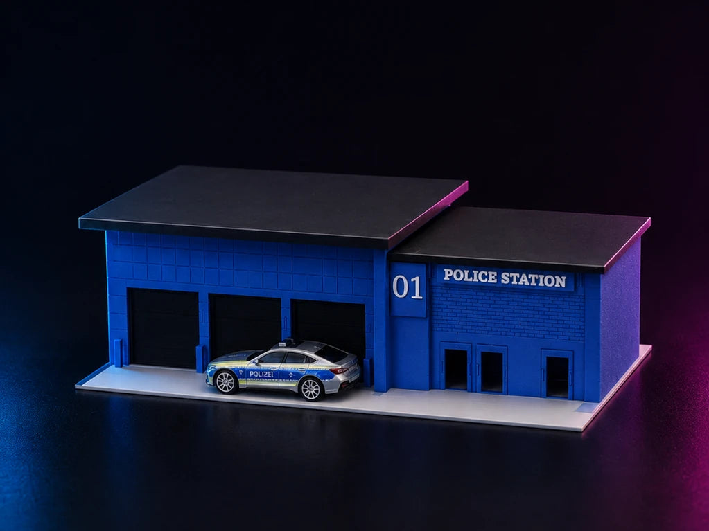 A printed police station in blue and white with POLICE STATION 01 across the front and a patrol car on the forecourt.
